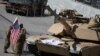 Soldados estadounidenses junto a un tanque M1/A2 Abrams, en la 30ª Exposición Internacional de la Industria de Defensa en Kielce, Polonia, el 5 de septiembre de 2022. REUTERS/Kacper Pempel/Archivo