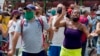 Muchas mujeres se sumaron a las protestas antigubernamentes en decenas de ciudades del país, como esta señora que protestó en La Habana el domingo 11 de julio.