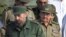 Raúl Castro y su hermano Fidel Castro