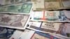 En Cuba circulan dos monedas desde 1993.(Archivo)
