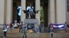 Estudiantes de la Universidad de La Habana rinden tributo al fallecido dictador Fidel Castro. (Foto: REUTERS/Alexandre Meneghini)