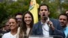El presidente interino de Venezuela, Juan Guaidó, habla a sus seguidores en Caracas.