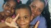 Jackeline Heredia Morales, junto a sus hijos, en una visita que le hicieran a prisión San José, La Habana. Cortesía Serafín Morán.