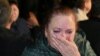 Una mujer en Tara, Omsk, llora mientras el gobierno ruso envía a más jóvenes a la guerra en Ucrania, el 26 de septiembre de 2022. (Reuters/Alexey Malgavko).