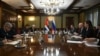 Esteban Lazo en Moscú con Dmitri Chernyshenko, vicepremier ruso.