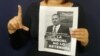 Nelva Ismaray Ortega sostiene una foto de su esposo, el líder de UNPACU José Daniel Ferrer, detenido tras las protestas del 11J en Cuba. (Foto: Facebook)