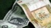 Un dólar se cambia en las casas de cambio estatales de Cuba por 87 centavos de CUC