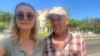 El acti.vista Pablo Enrique Delgado junto a la diplomática ucraniana Iryna Bylik. (Twitter)